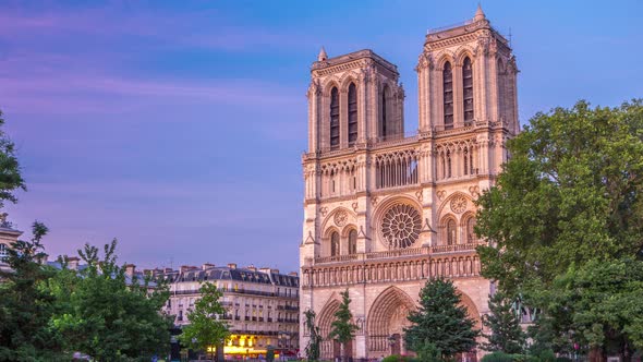 Front View of Notre Dame De Paris Cathedral Day to Night Timelapse After Sunset