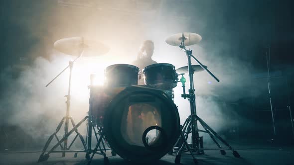 Drummer Is Playing the Drum Kit in a Clouded Rehearsal Studio