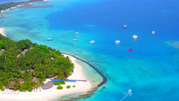 Aerial drone seascape of coastline beach by blue sea and sand background