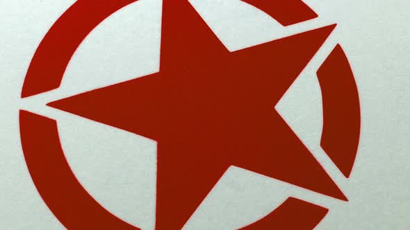 Red Star Graphic Spray Painted Onto Surface