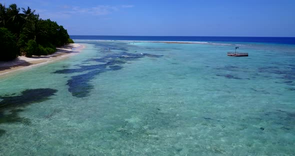 Beautiful birds eye abstract view of a white sandy paradise beach and blue sea background in high re