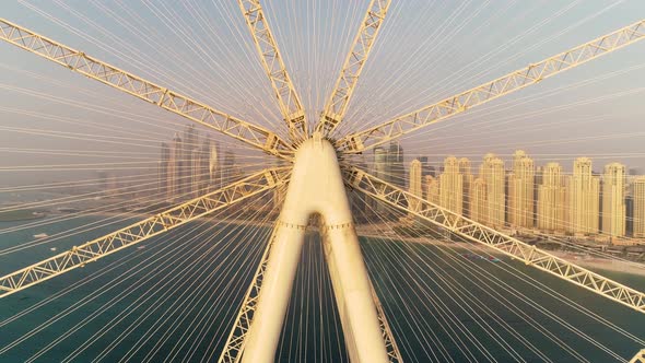 Aerial view passing by of the Ferris wheel under construction, Dubai.