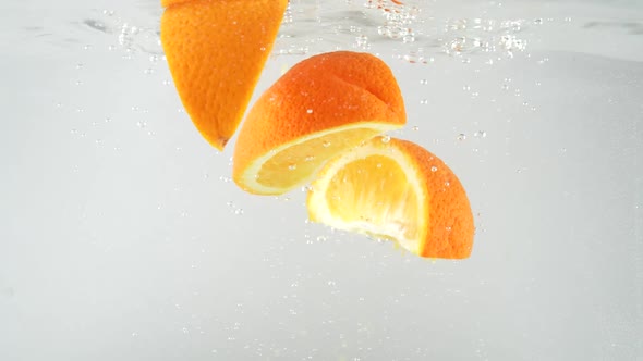 Orange Slices Falling into Water 15