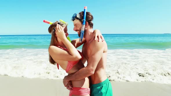 Couple embracing each other on beach