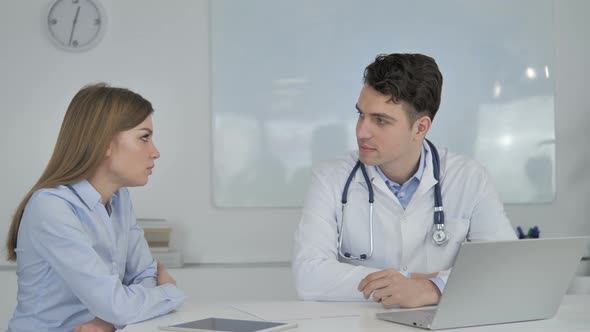 Doctor Listening Cpmplaint of Patient