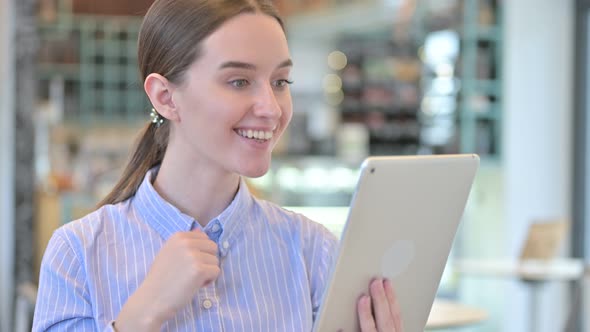 Portrait of Video Chat on Tablet By Young Businesswoman 