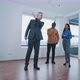 Real estate agent showing house to potential buyers - VideoHive Item for Sale
