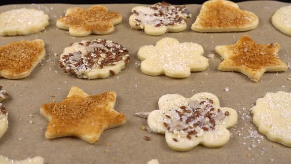 The process of making cookies from shortbread dough.