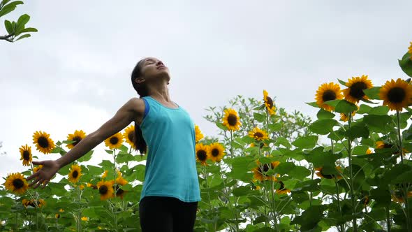 Beautiful woman raising hand in the air. Freedom Happy Time.