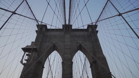 SLOW MOTION: Empty Brooklyn Bridge with No People Early Morning at Sunrise in Beautiful Sunlight in