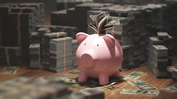 Cute pink piggy bank stuffed with dollars and surrounded by piles of money. 4KHD