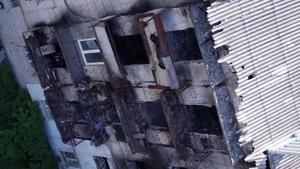 Vertical Video of the Consequences of the War in Ukraine  a Destroyed Residential Building