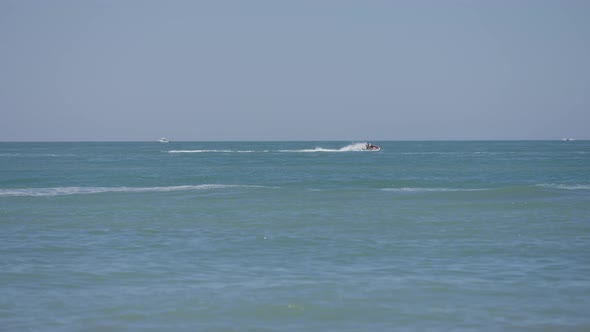 Riding jet skis on the sea