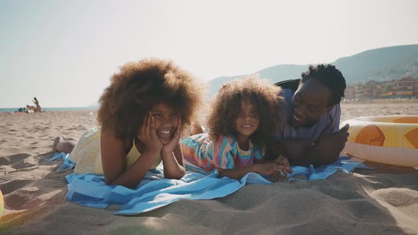 Happy family spending the day at the beach.