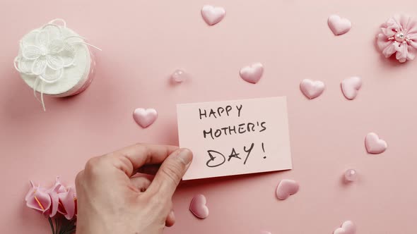 Happy Mother's Day Letter on Pink Background