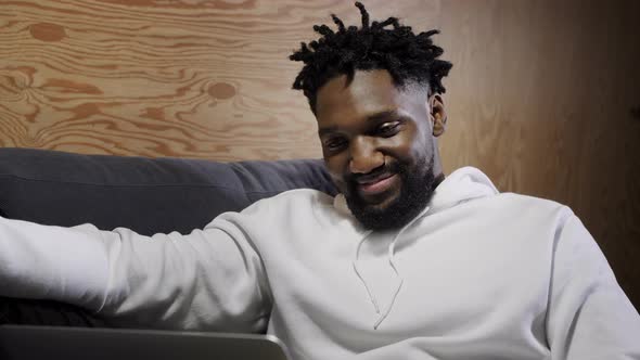 Black Man Working From Home Having Online Group Videoconference On Laptop