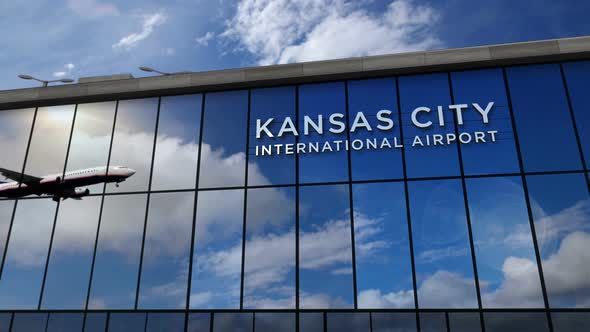 Airplane landing at Kansas City Missouri mirrored in terminal