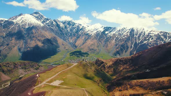 Aerial View of Stepantsminda and the Caucasus Mountains Kazbegi Region Georgia