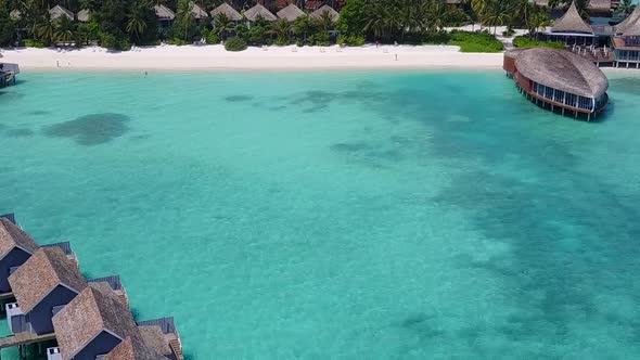 Aerial drone travel of coast beach time by clear ocean and sand background