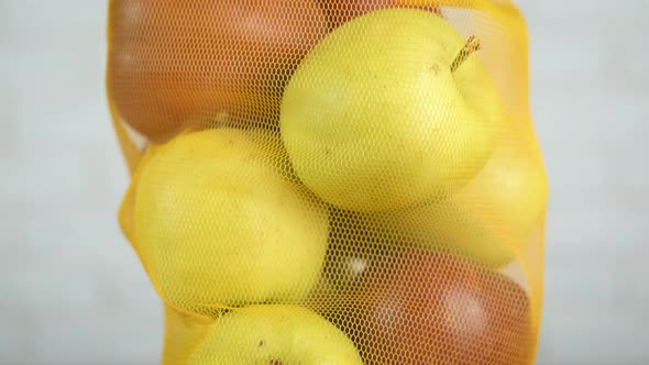 Colorful apples in a bag