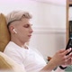 Young Man Using Smartphone and Headphones - VideoHive Item for Sale