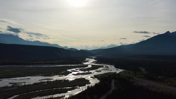 Flood multibranch streams  formed from melting snow and ice in Alaska mountains valley