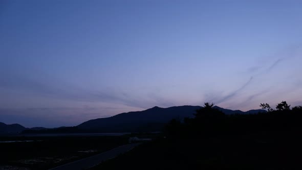 Sunset over the Forested Mountains