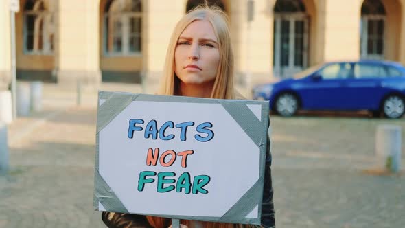 Facts Not Fear Slogan on Protest Walk