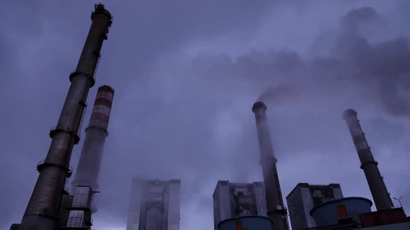 Smoking Chimneys Of A Power Plant