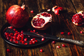 Whole and Opened Pomegranates on Metal Plate. - PhotoDune Item for Sale