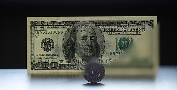 Coin And 100 Dollar Bill