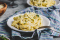 Homemade Fettuccine Pasta with Alfredo Sauce on Plate - PhotoDune Item for Sale