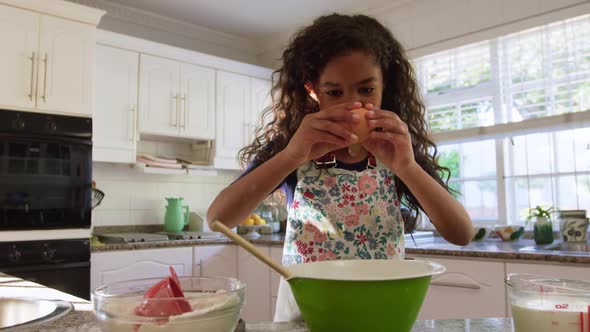 Young girl making Christmas cookies at home