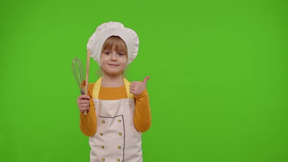 Girl Kid Dressed As Cook Chef Baker Posing Smiling Looking at Camera on Chroma Key Background