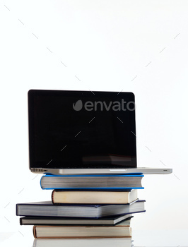 er laptop with black blank screen isolated on white background. Vertical photo, copy space, template.