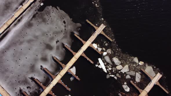 River mooring for yachts. cold, ice. sunset. aerial view