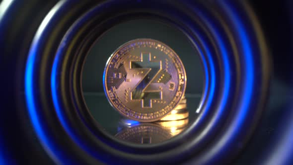 Gold Coin Zcash ZEC in the Center of Tunnel with Beautiful Blue and Yellow Light. Camera Move Back