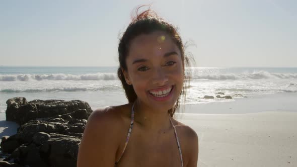 Young woman by the sea