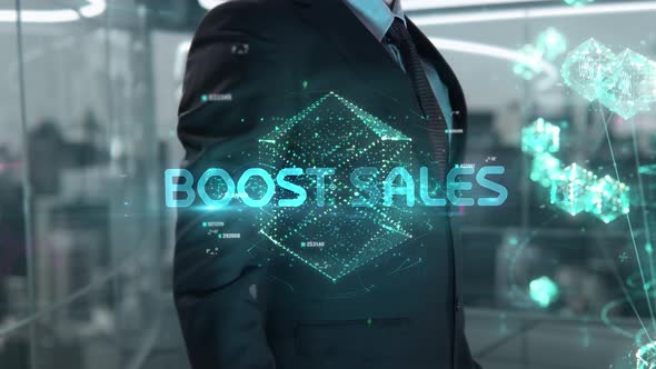 Businessman with Boost Sales Hologram Concept