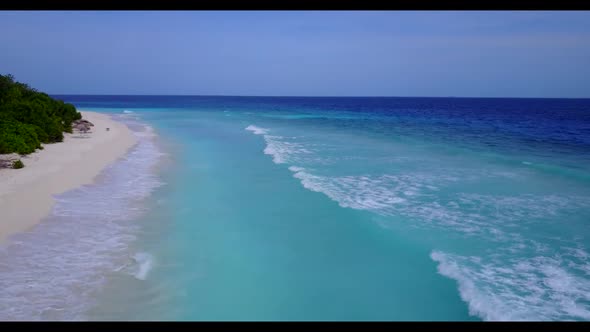 Aerial flying over tourism of luxury resort beach holiday by turquoise sea and white sandy backgroun