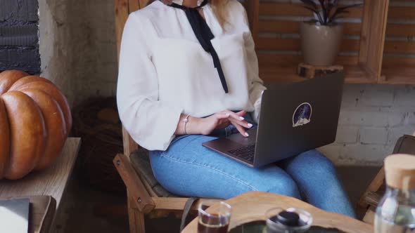 A Woman Uses a Computer