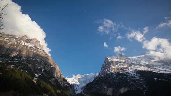 Day to Dusk Timelapse moving clouds in Swiss Alps