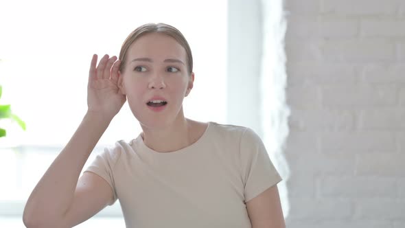 Woman Listening Secret Carefully with Interest