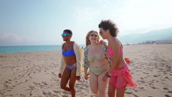 multiethnic young women having fun on the beach