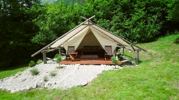 Tracking shot of a glamping tent in an eco camping in Slovenia.