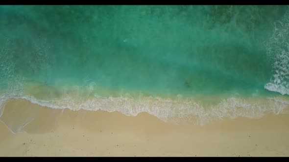 Aerial view scenery of tranquil lagoon beach vacation by blue water and white sand background of jou