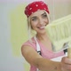 Happy Female Painter Pointing with Brush - VideoHive Item for Sale