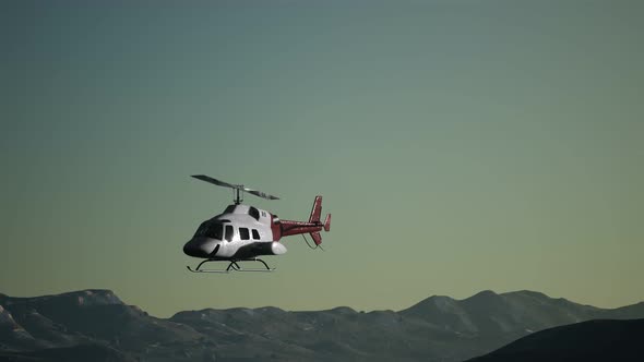 Extreme Slow Motion Flying Helicopter and Sunset Sky