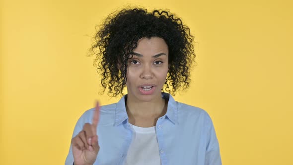 Portrait of Attractive Casual African Woman Saying No By Finger