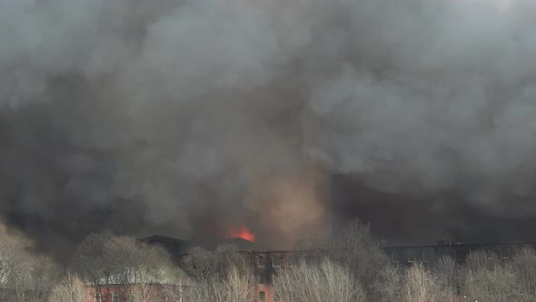 Flames Behind the Building